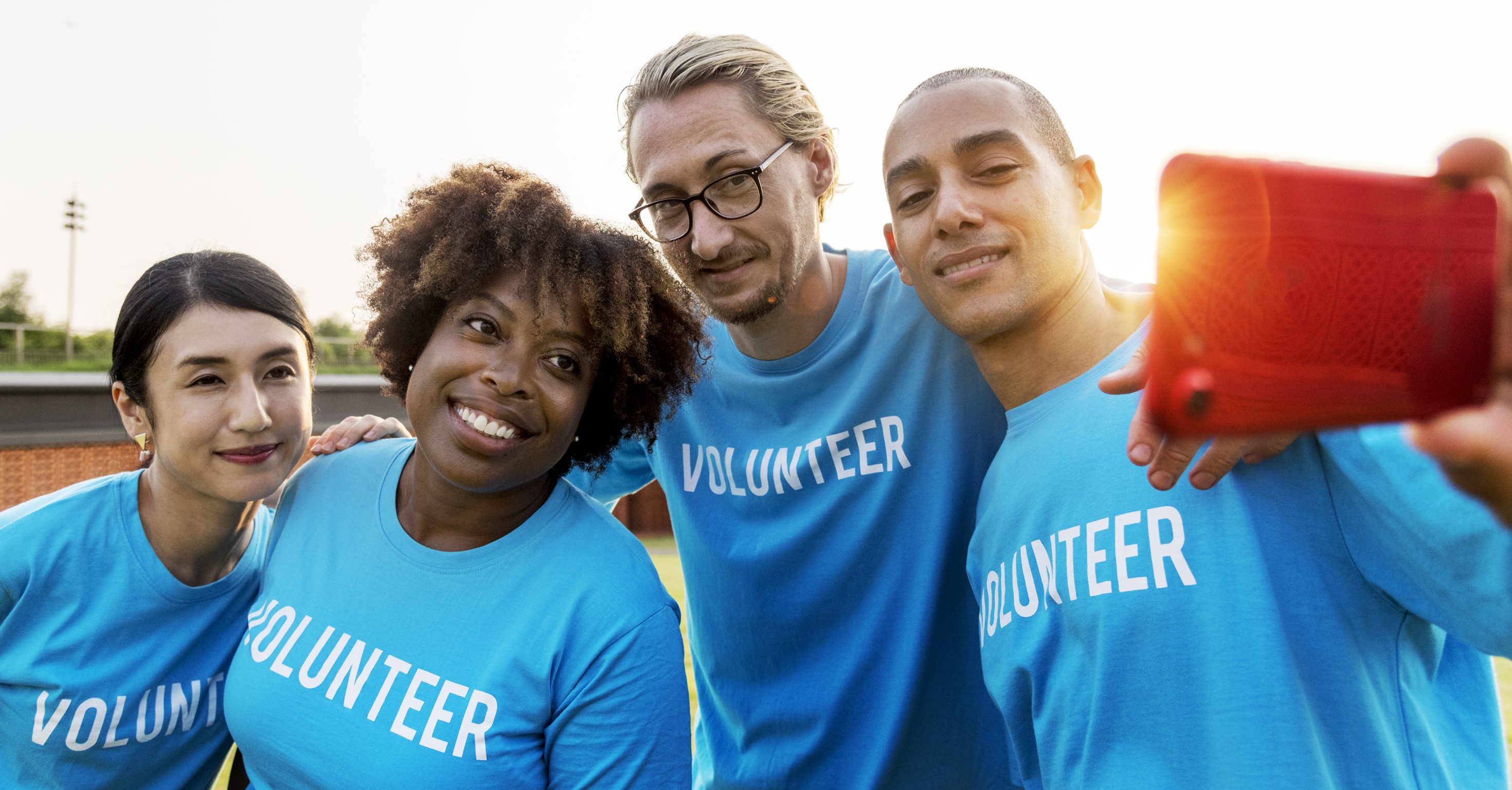 Diverse volunteers taking a selfie together