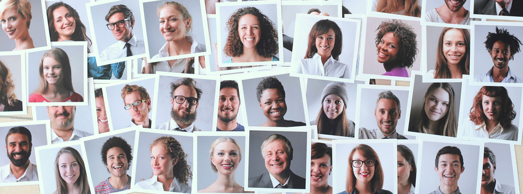 Many portraits of happy, ethnically diverse adults of all ages