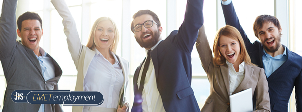 Group of business people cheering with their arms in the air.