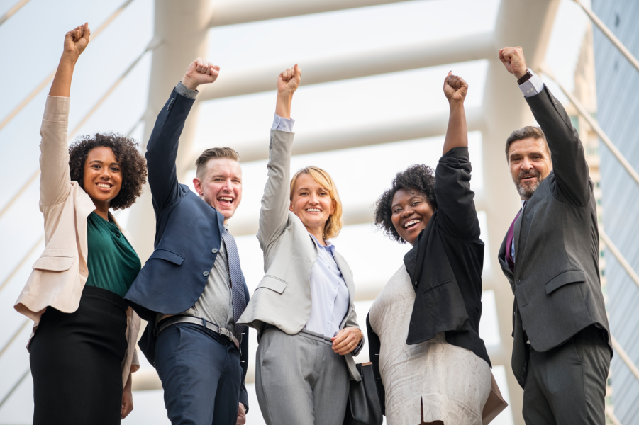 Diverse business people cheering